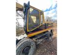 Caterpillar M318, wheel excavator, Construction