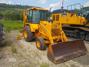 
                    1988 DEERE 210C
                