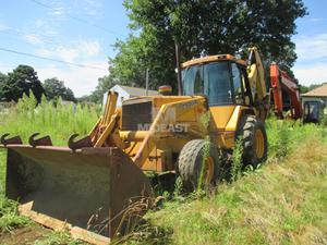 
                    1985 DEERE 710B
                